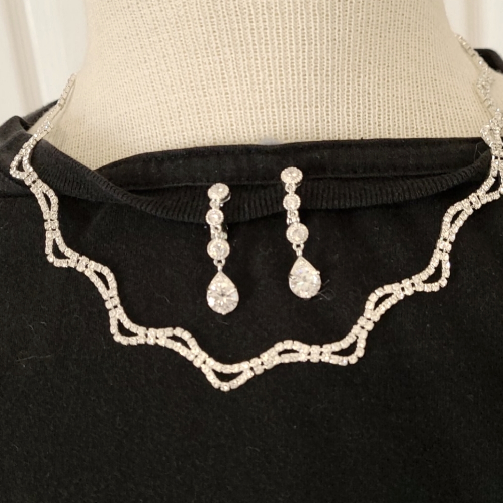 CZ costume jewelry earrings and necklace.